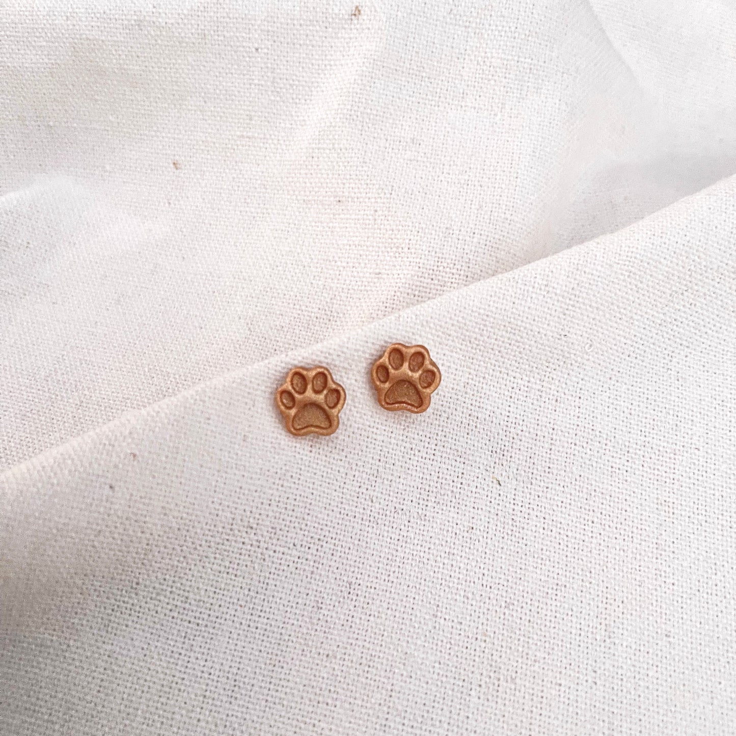 Paw Studs image 0